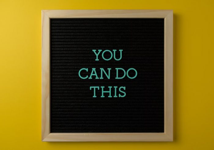 Inspirational message 'You Can Do This' displayed on a blackboard with a bold yellow backdrop.